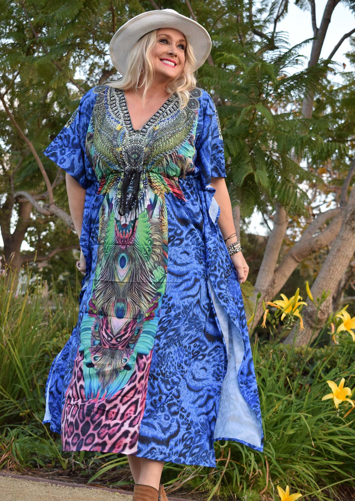 lady wearing animal print blue maxi kaftan with drawstring #color_Blue Multi Leopard