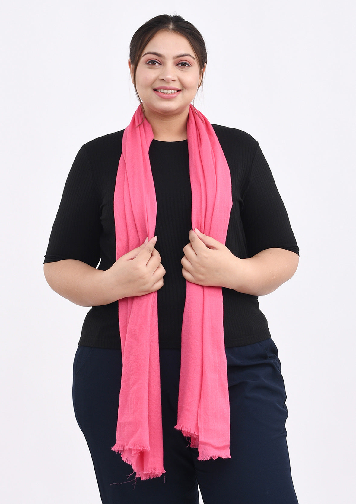 lady carrying luxe cashmere wool pink scarf #color_Rose Pink