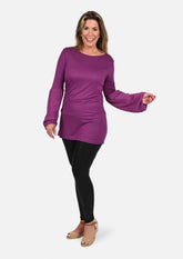 lady wearing trimmed blouson sleeve tunic purple top #color_Plum purple