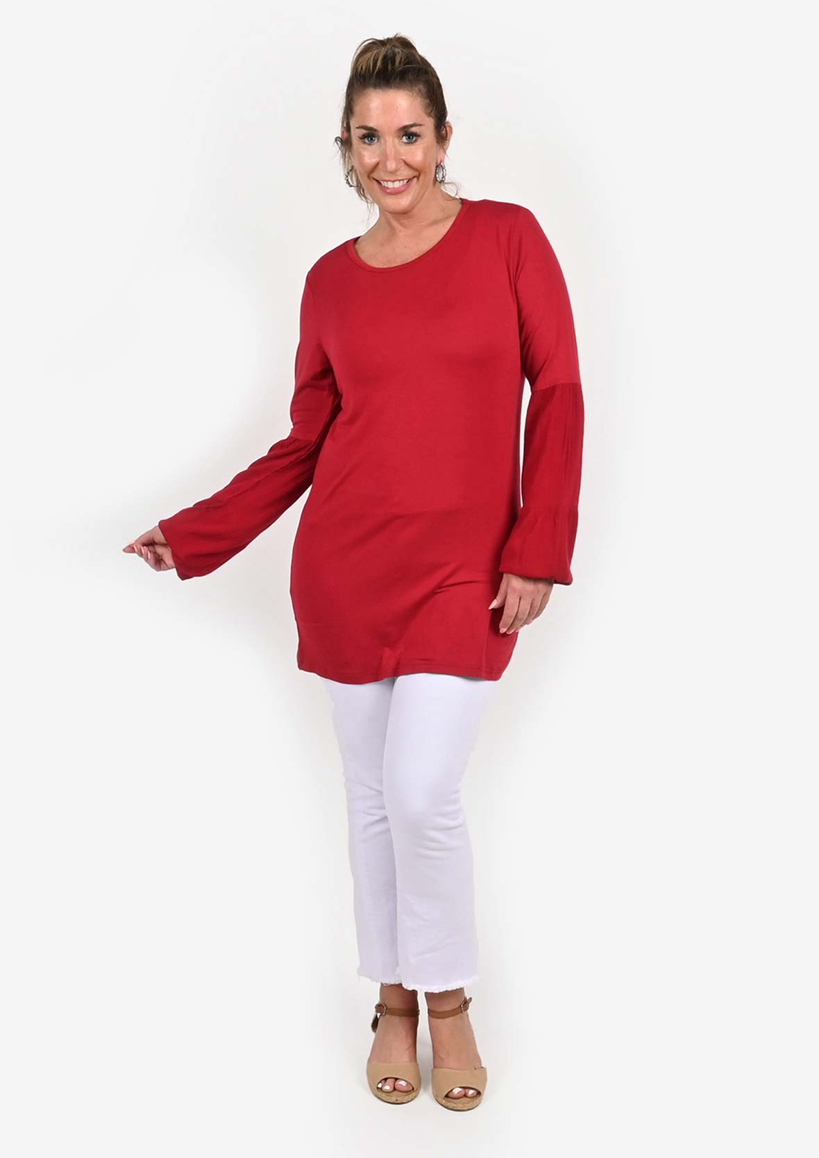 lady wearing trimmed blouson sleeve tunic red top #color_Apple Red