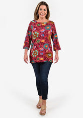 lady wearing classic crew neck red tunic top #color_Red Multi Floral