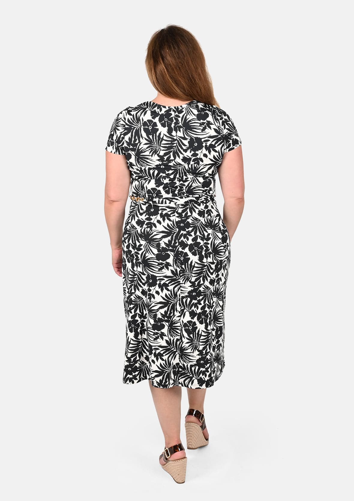 back side of tropical print black and white dress with waist tie #color_Black and White Floral