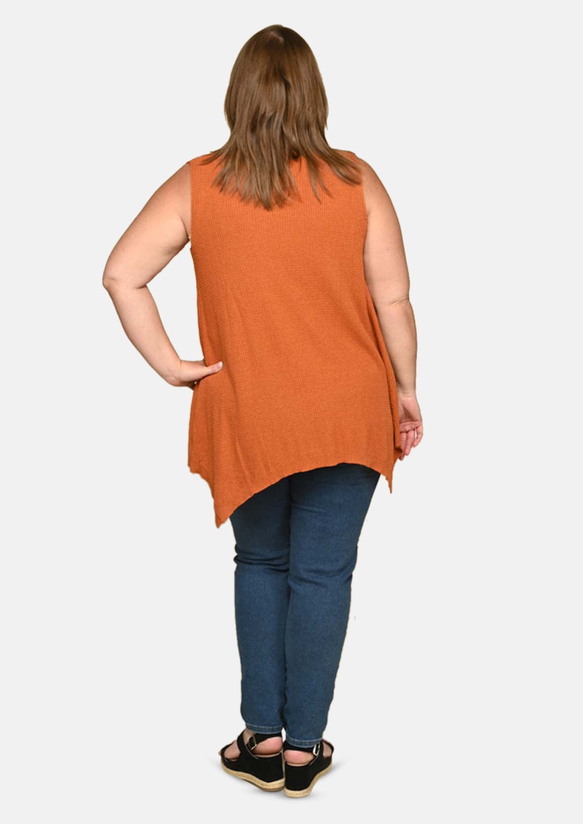 back side of sleeveless knit orange vest with asymmetrical hem #color_Squash Orange