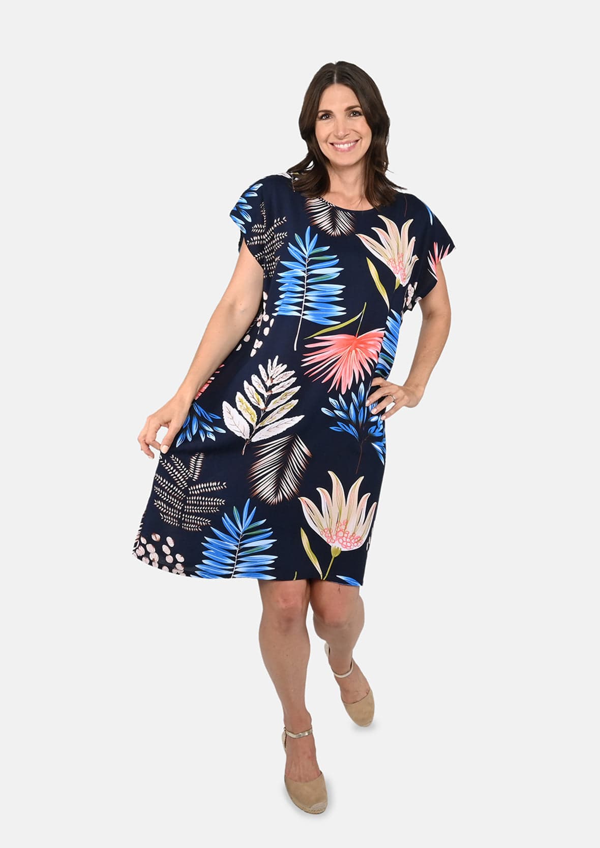 lady wearing floral print tunic navy dress #color_Navy Red White Print