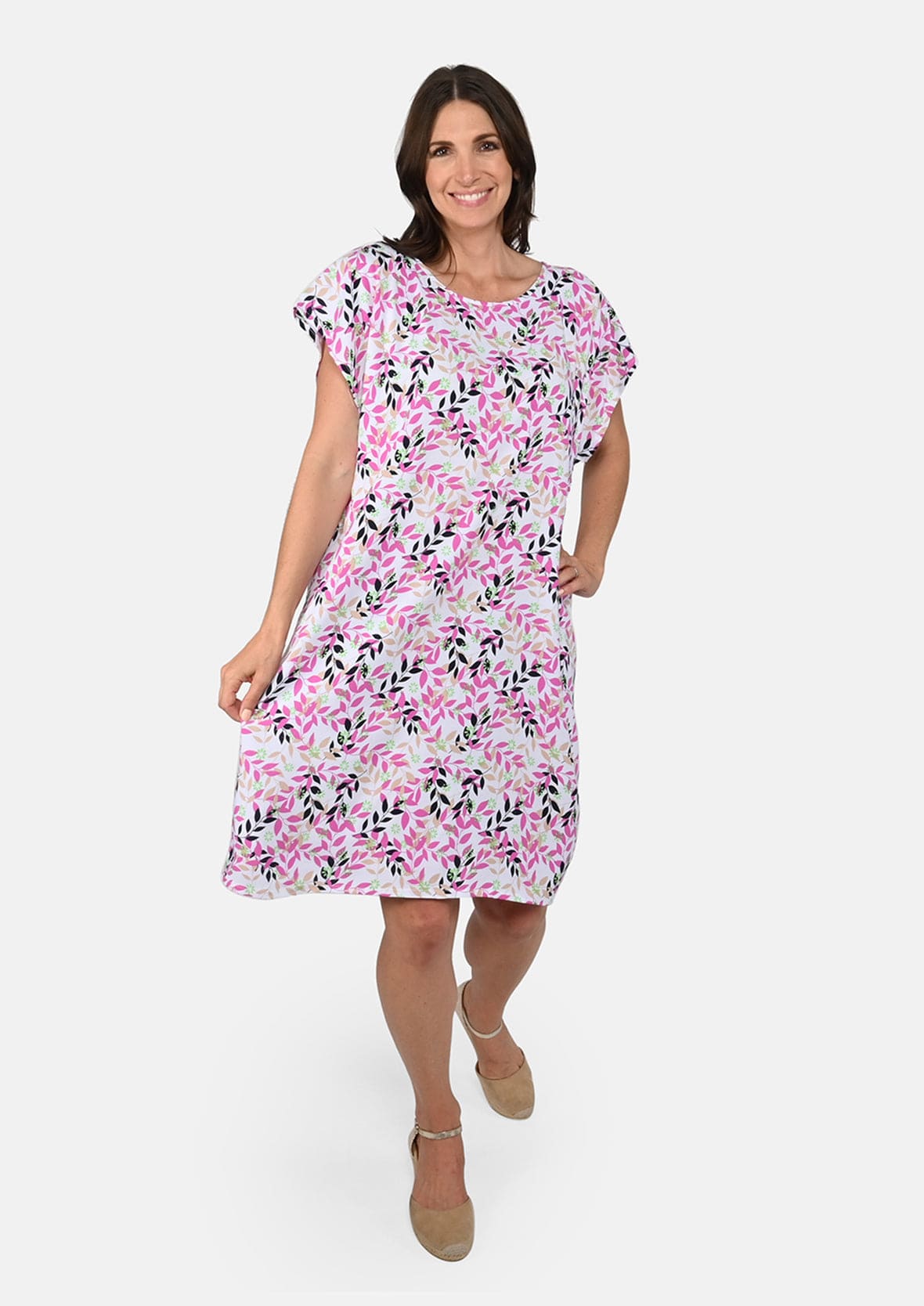 lady wearing crew neck floral pink tunic dress #color_Pink Printed