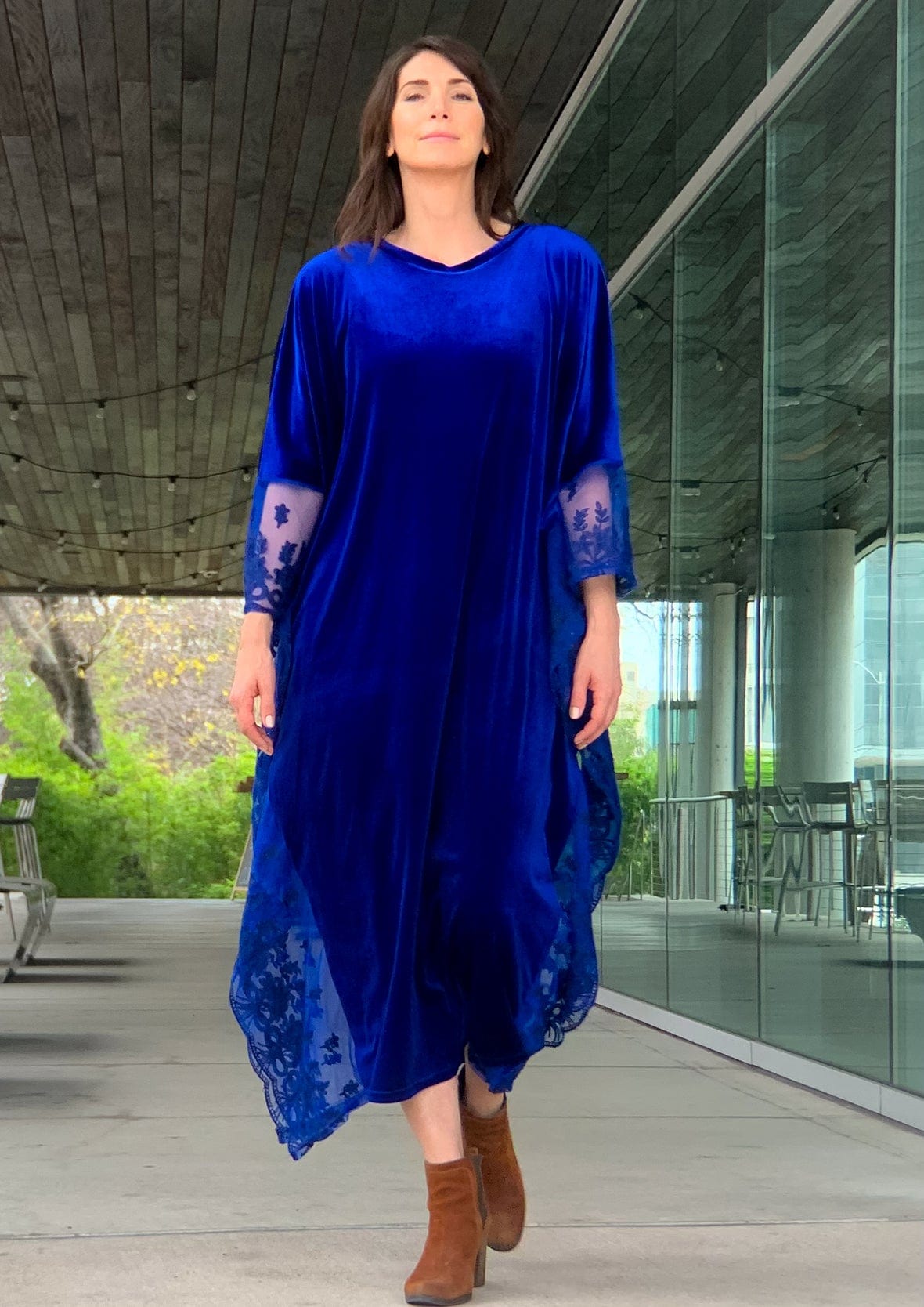 lady wearing velvet maxi bright blue kaftan with lace detailing #color_Bright Blue