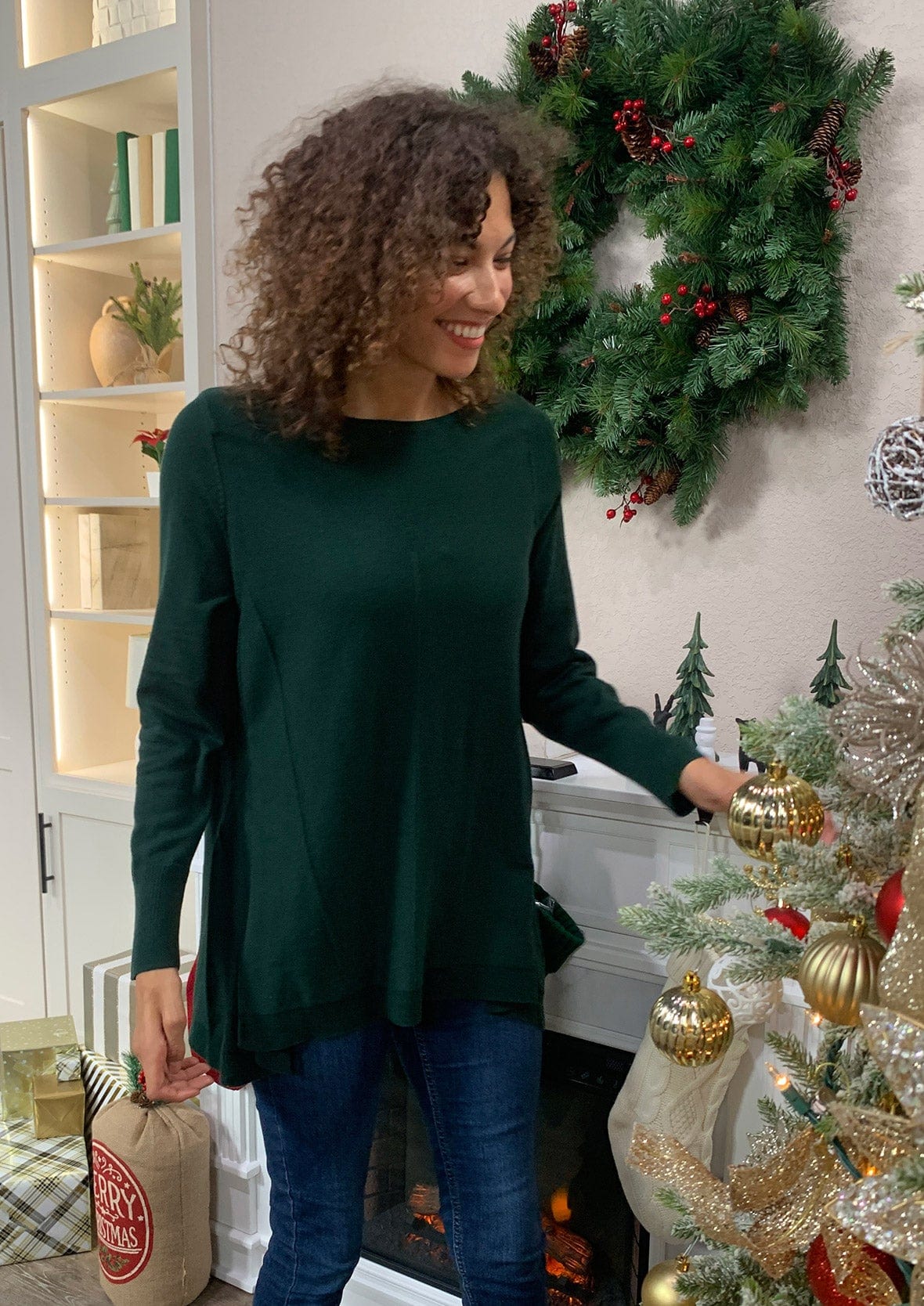 lady wearing cashmere wool green blend tunic sweater #color_Juniper Green