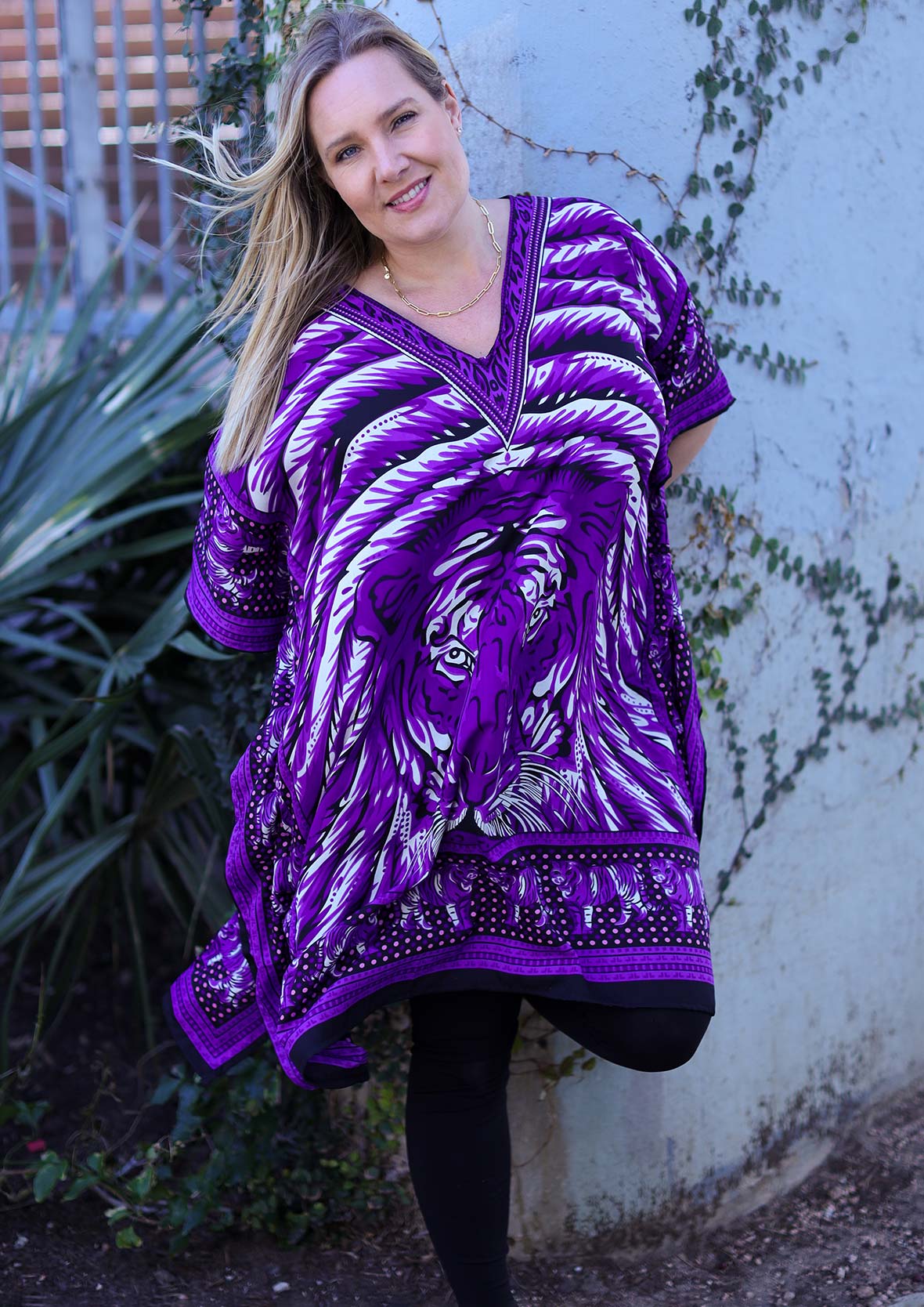 lady wearing tiger print purple kaftan with pockets #color_Purple Animal Fantasy