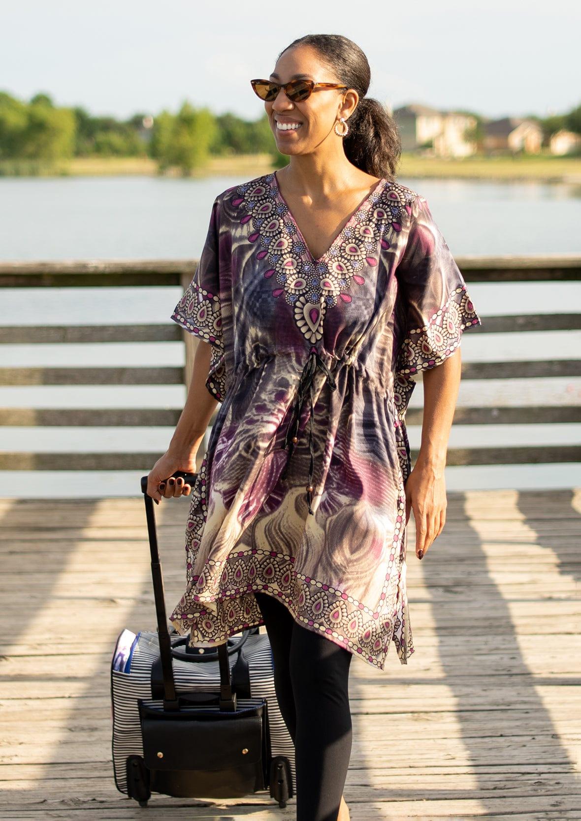 lady wearing paisley print brown kaftan with pockets #color_Brown Multi color Fantasy